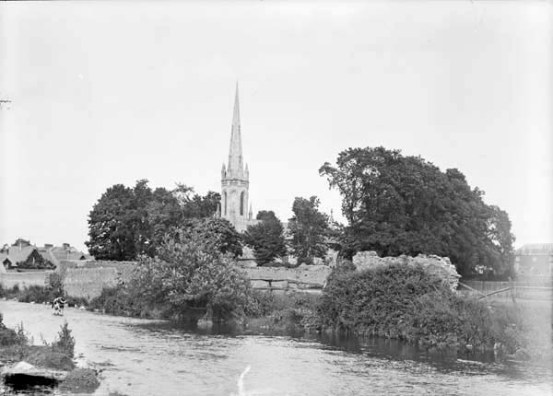 An early twentieth century photograph by the Horgan brothers of Youghal showing St John the Baptist's Church, Midleton, across the Owenacurra River. The  present church was completed in 1825 and stands on the site of the abbey church of Chore.