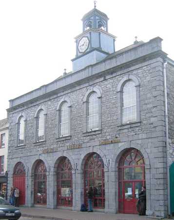 Built or rebuilt by George Brodrick, 4th Viscount Midleton, in 1789, the Market House is the most important building on Main Street.  It replaced a market house dating from the 1680s and was the location for the Corporation's meetings and elections, as well as being the Borough and  manorial courthouse. It's now the town library.