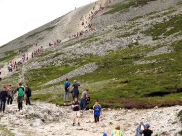The annual pilgrimage to Croagh Patrick, Ireland's holy mountain, now takes place on Reek Sunday, the last Sunday in July. This appears to be a Christianization of part of the Lughnasa festival. (AP, Helen O'Neill)