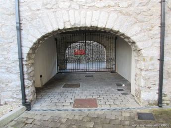 View of Drury's Avenue through the archway under the granary which marks the north-eastern boundary of the site of the 'lost' brewery.