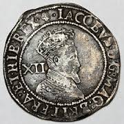 Early seventeenth century silver shilling of King James I. Silver was the preferred medium of currency at the time.